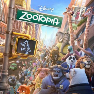 Animated animals of various species crowd a busy city street under a green “Zootopia” sign, with tall buildings in the background and a crosswalk light showing a walking animal—look closely for Hidden Mickeys nodding to the Blu-ray Bonus Features.