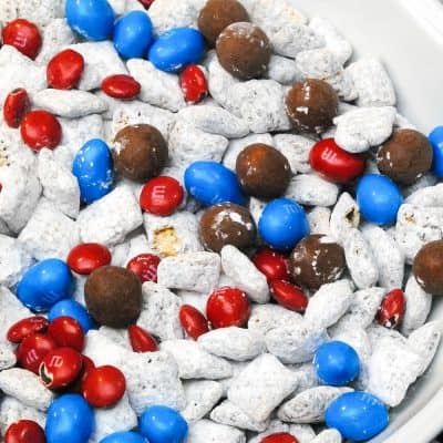 red white and blue dessert snack mix with powdered sugar