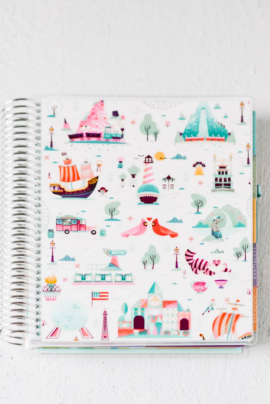 Custom cover on Erin Condren deluxe monthly planner with multicolor monthly tabs