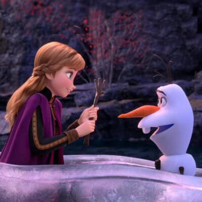 Frozen 2 still with Anna and Olaf in ice canoe