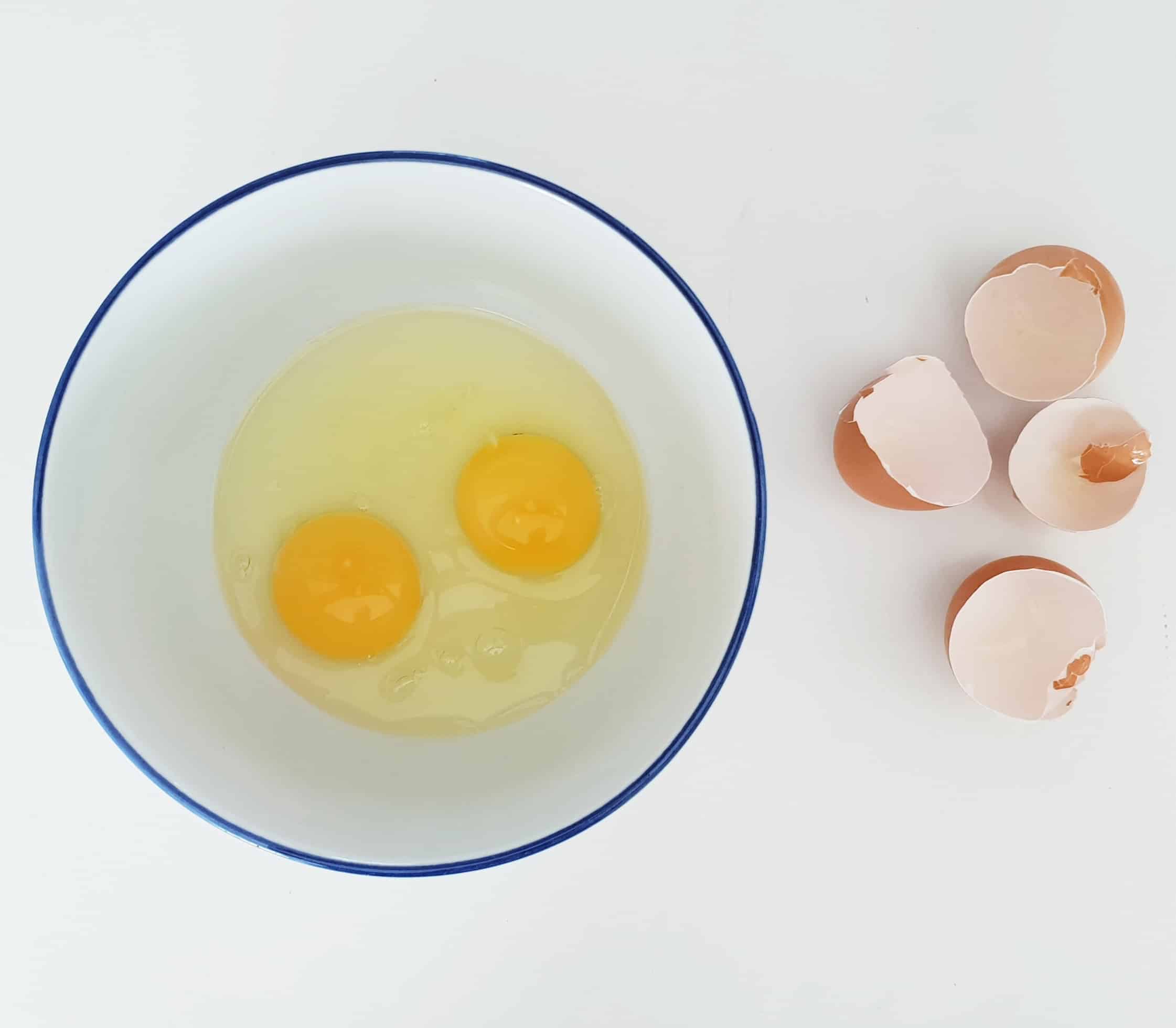 cracked eggs in bowl