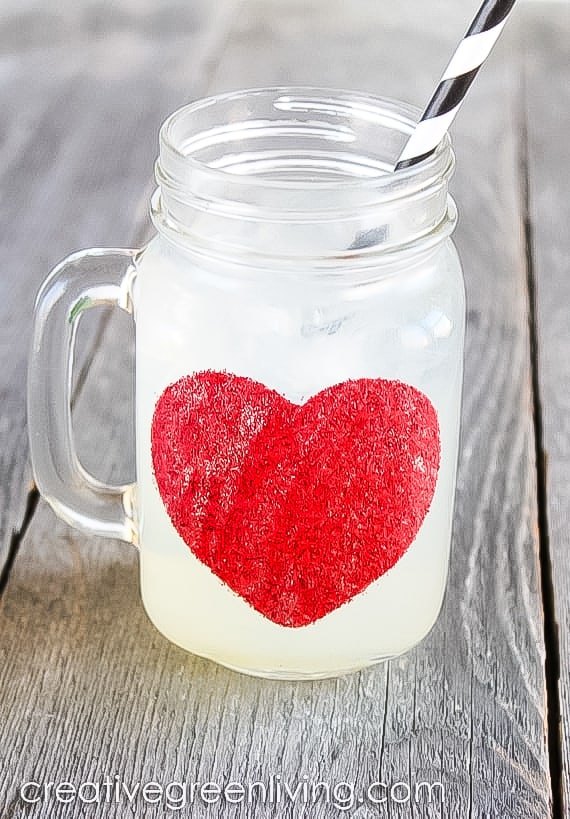 red glitter heart on mason jar mug