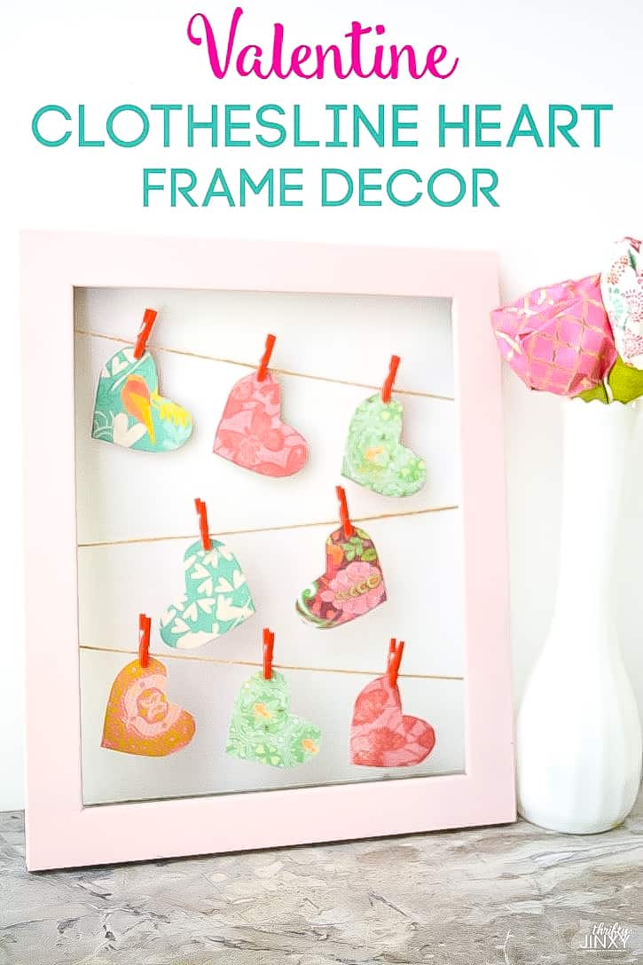 frame with hanging hearts decoration