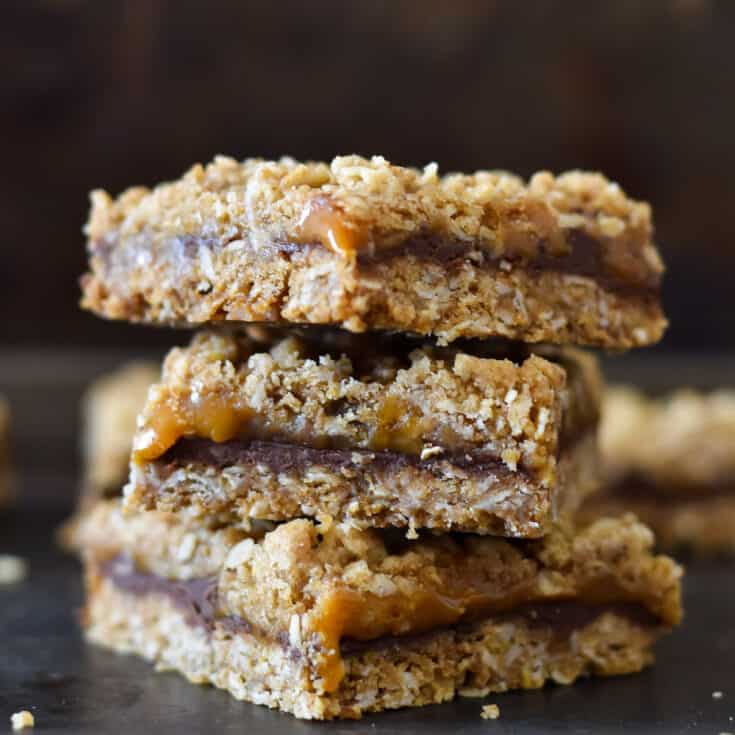 salted caramel bars with layers of oats and chocolate