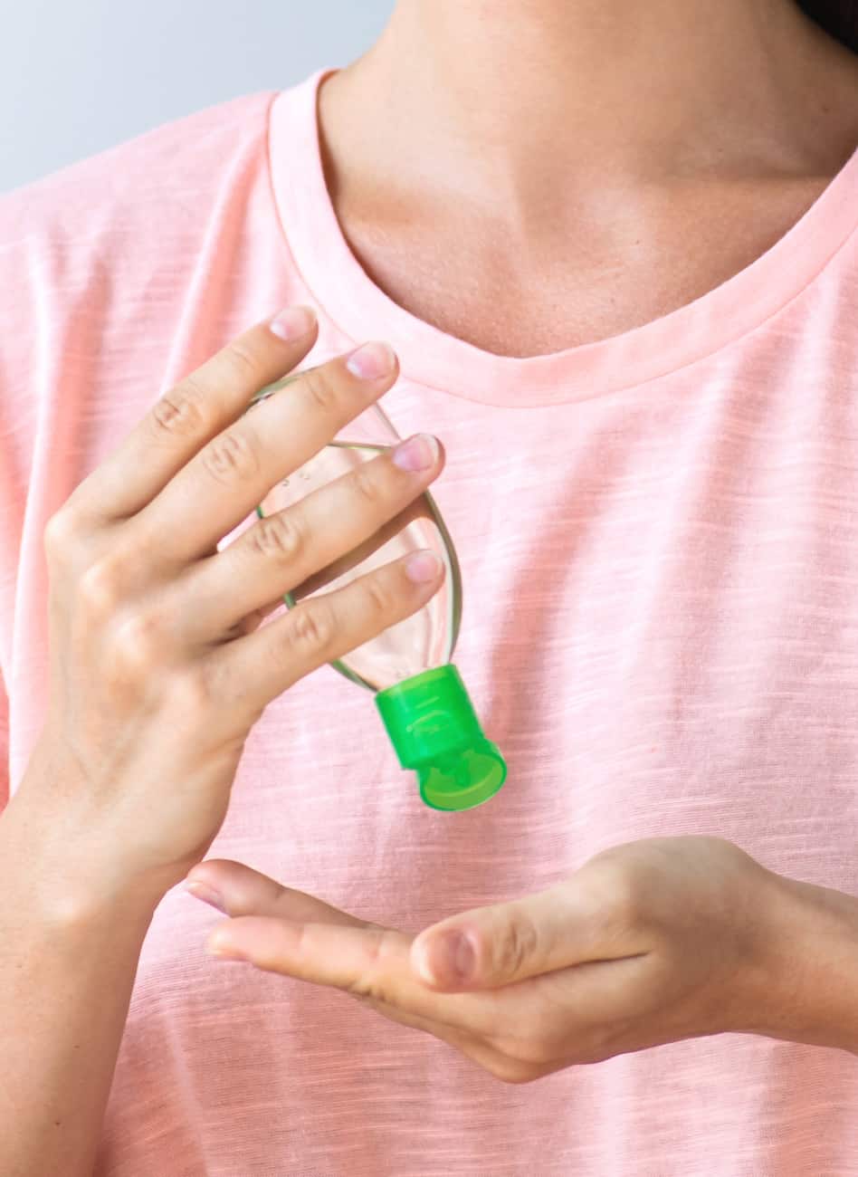 hand sanitizer squeezing into hands