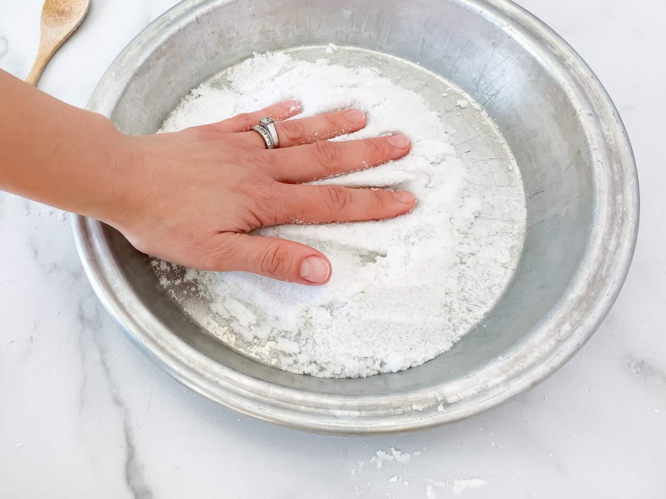 hand in diy kinetic sand