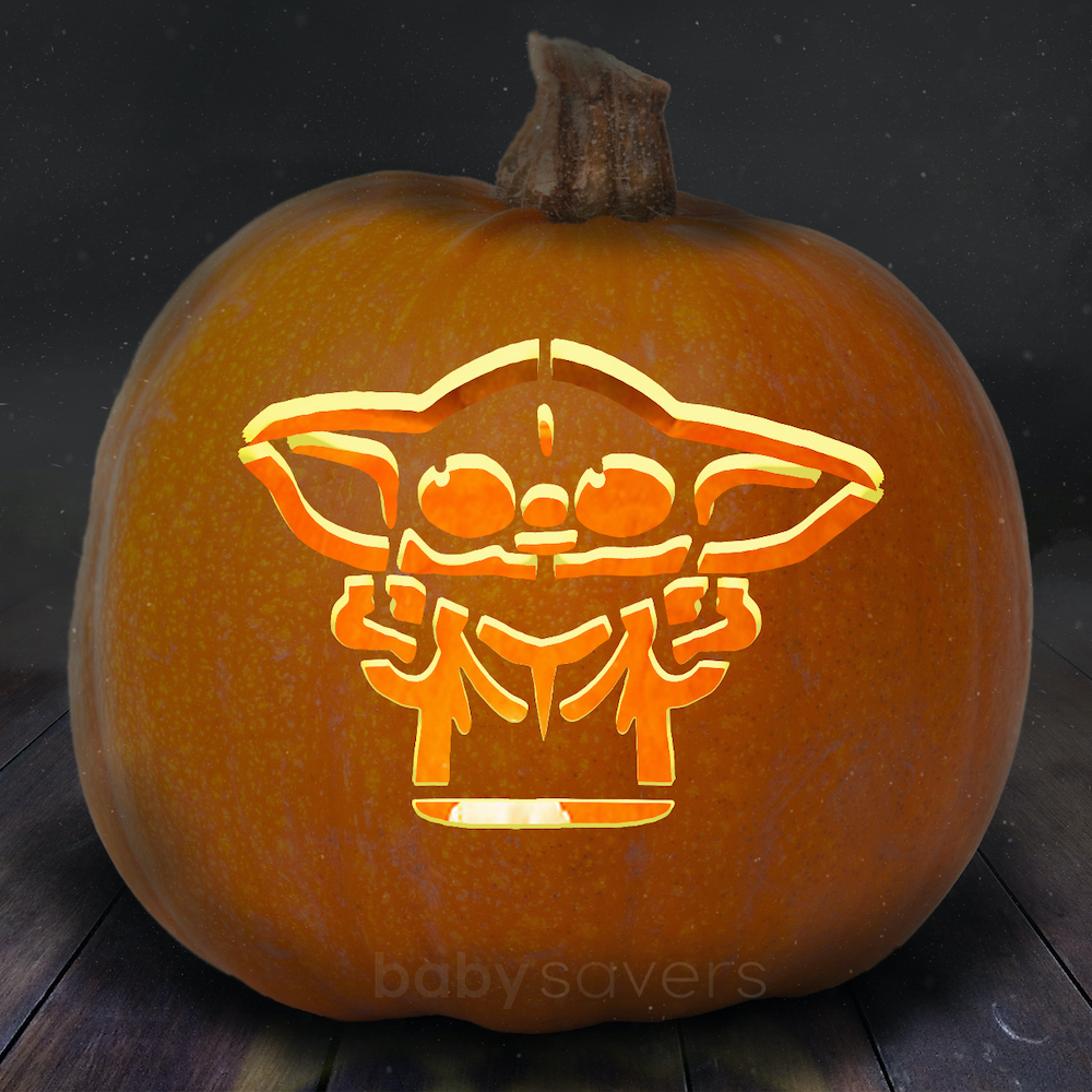 Carved Pumpkins, Smiling, on a Table Out of Doors Facing and Side