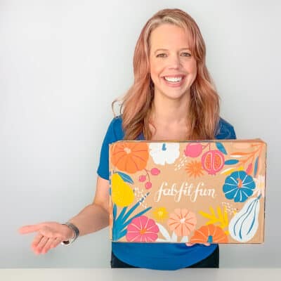 smiling holding a fabfitfun box