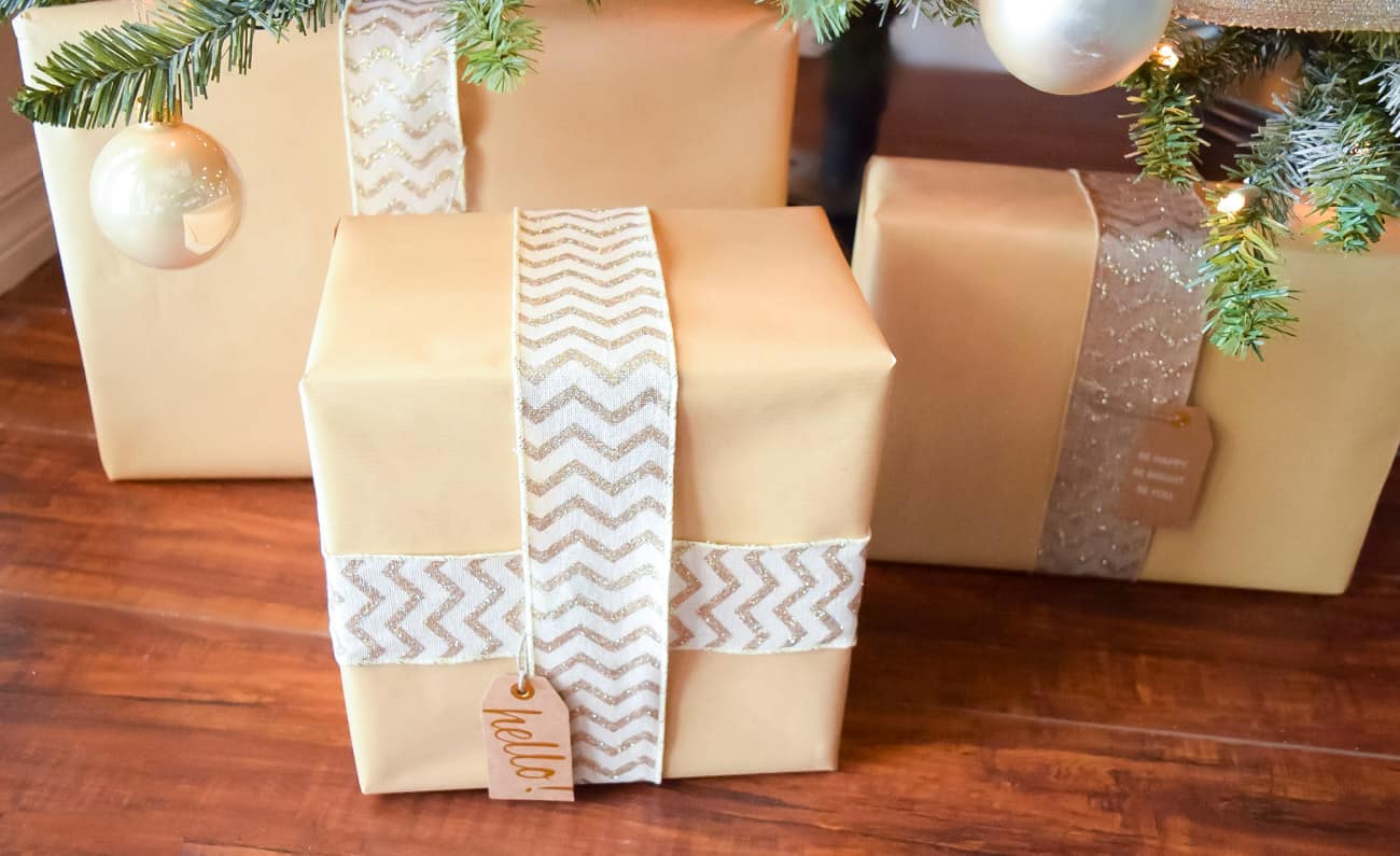 wrapped presents to match gold and white Christmas tree