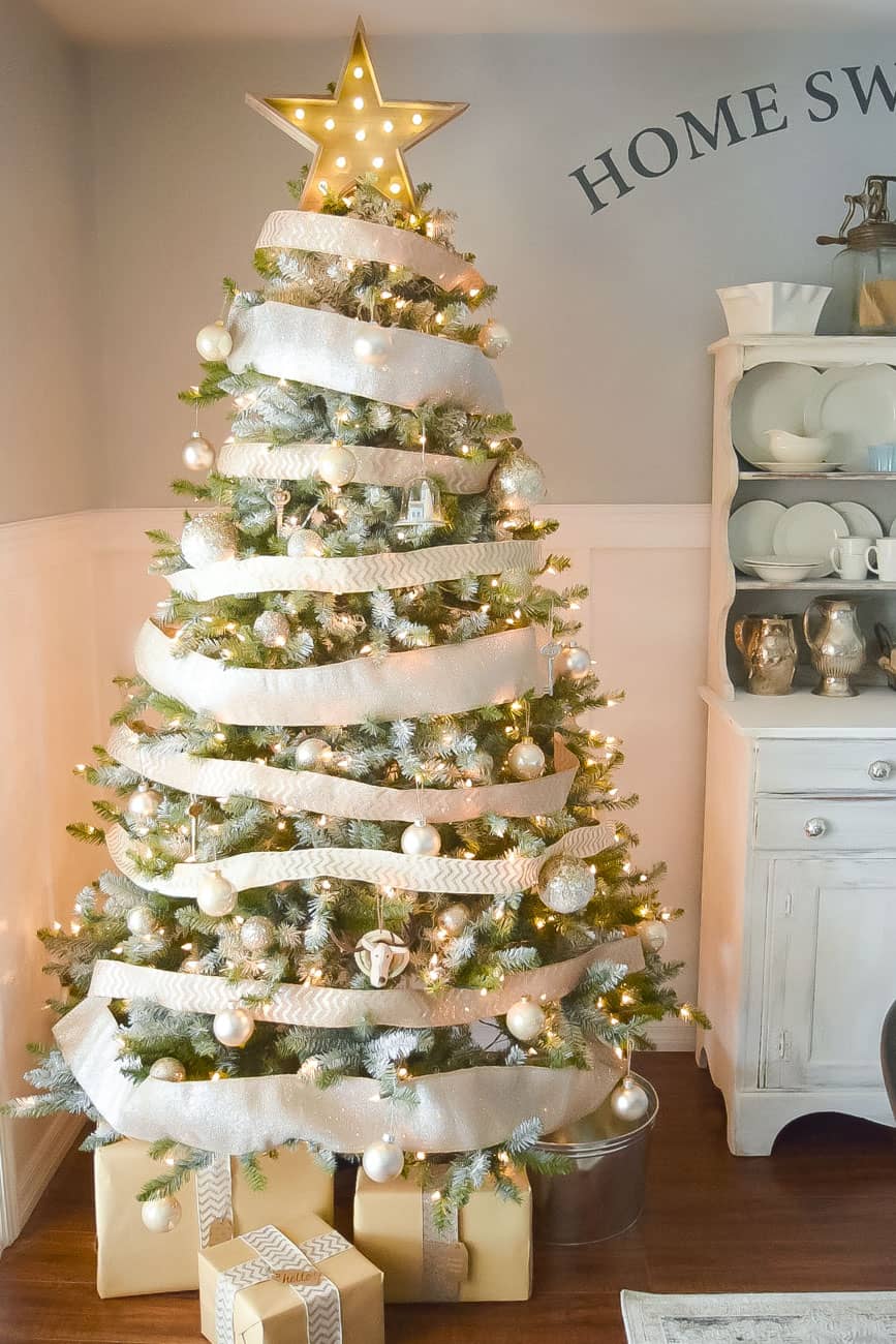 Gold and white Christmas tree with homemade topper