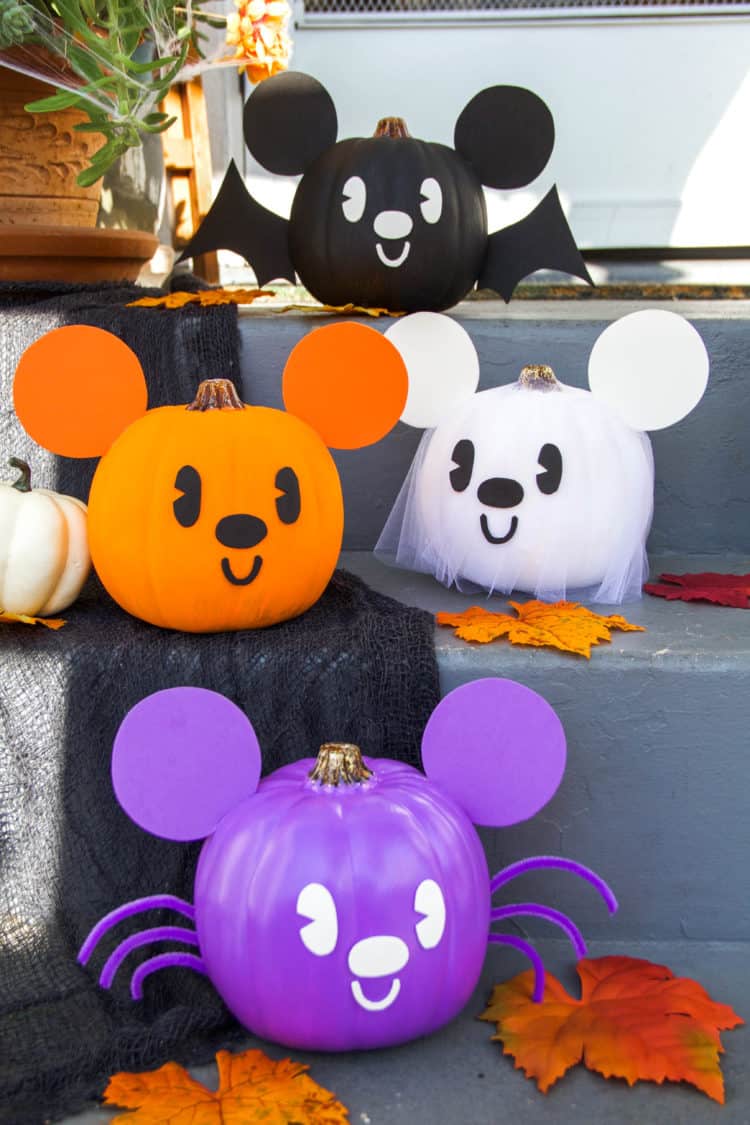 Mickey Mouse painted pumpkins in purple, orange, black and white