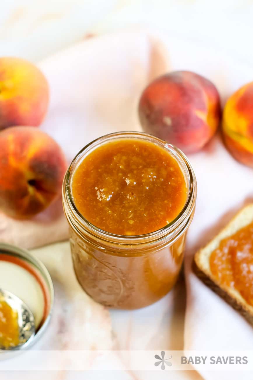 fresh peach butter in a glass jar