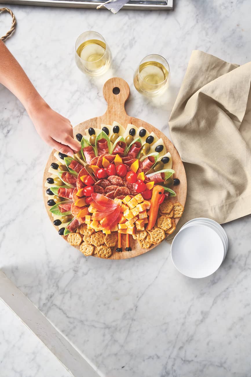 thanksgiving charcuterie board in shape of turkey