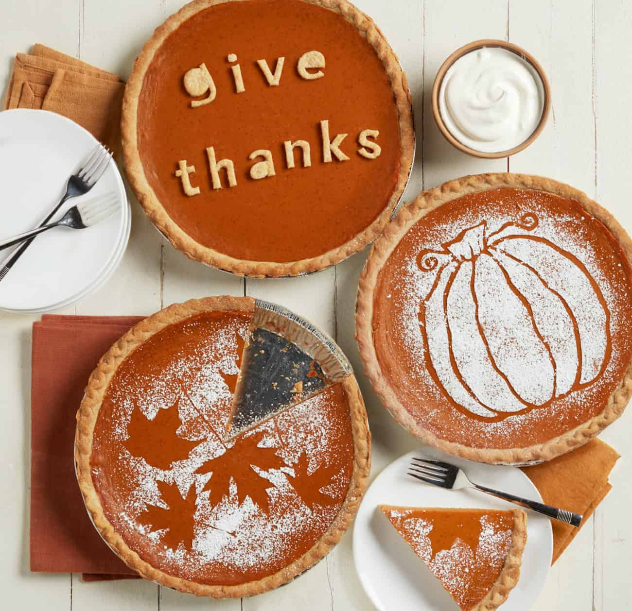pumpkin pie with Give Thanks and powdered sugar on pie