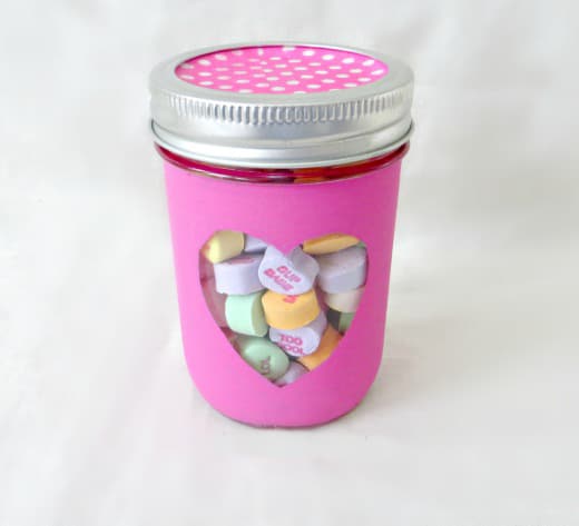 teacher valentine gift, mason jar with heart cut out filled with valentine candy conversation hearts