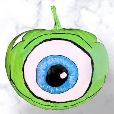 mike wazowski pumpkin on a marble background