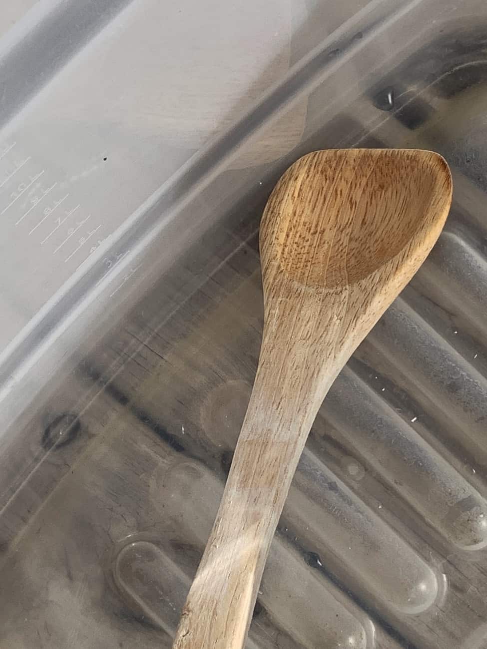 wooden spoon used to stir giant bubbles