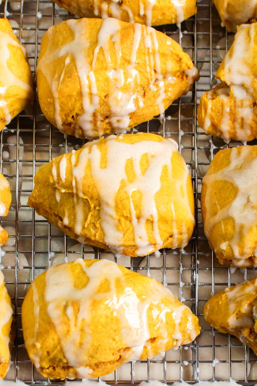 pumpkin scone recipe baked scones on wire rack with icing