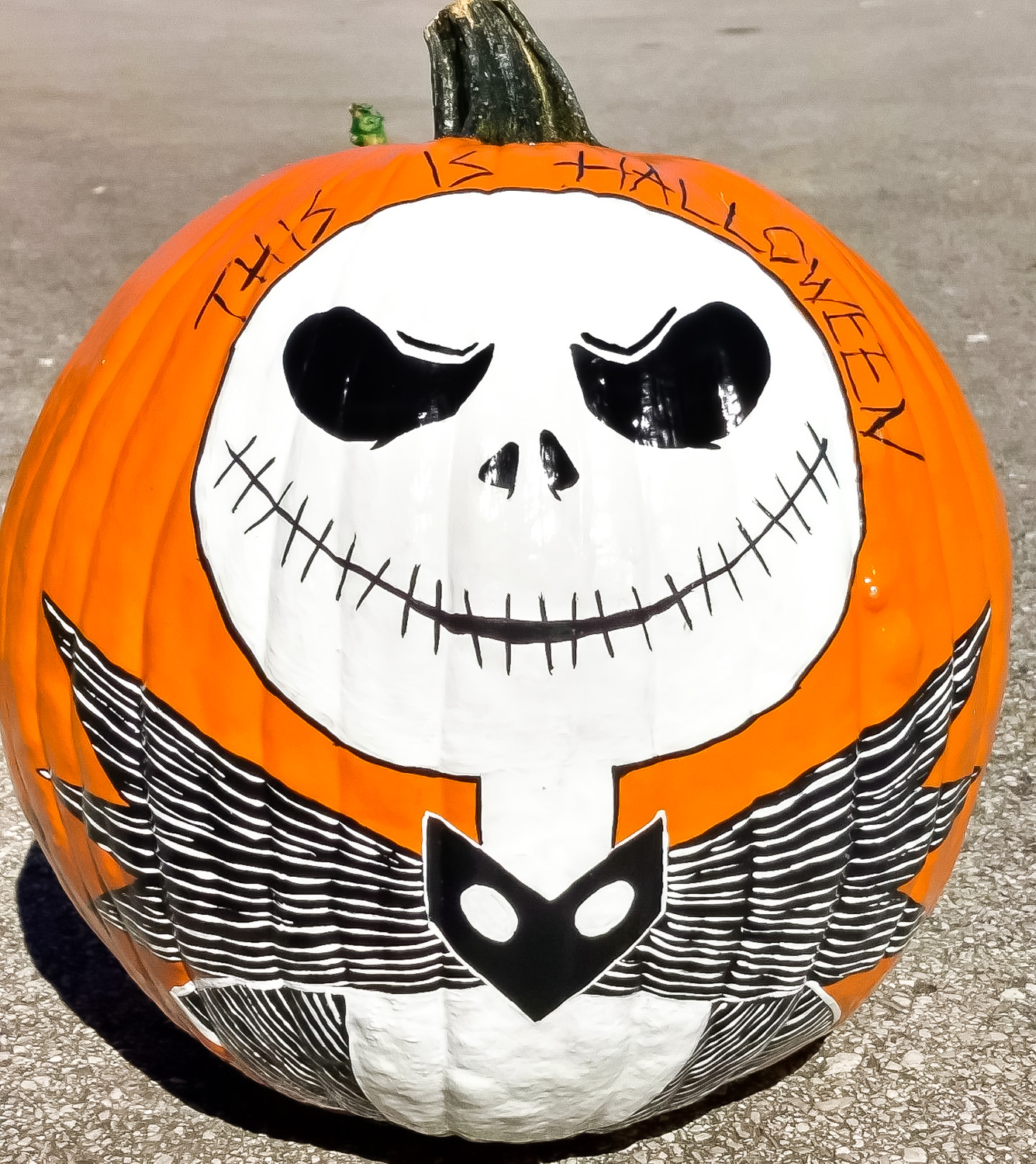 Jack Skellington painted pumpkin with This is Halloween