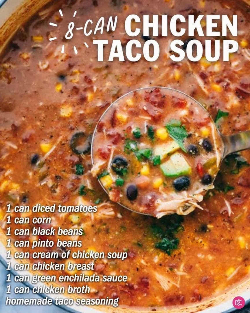 A close-up image of a vibrant 8-can chicken taco soup in a pot, perfect for easy dinner ideas, featuring ingredients like diced tomatoes, black beans, and corn, garnished with fresh herbs