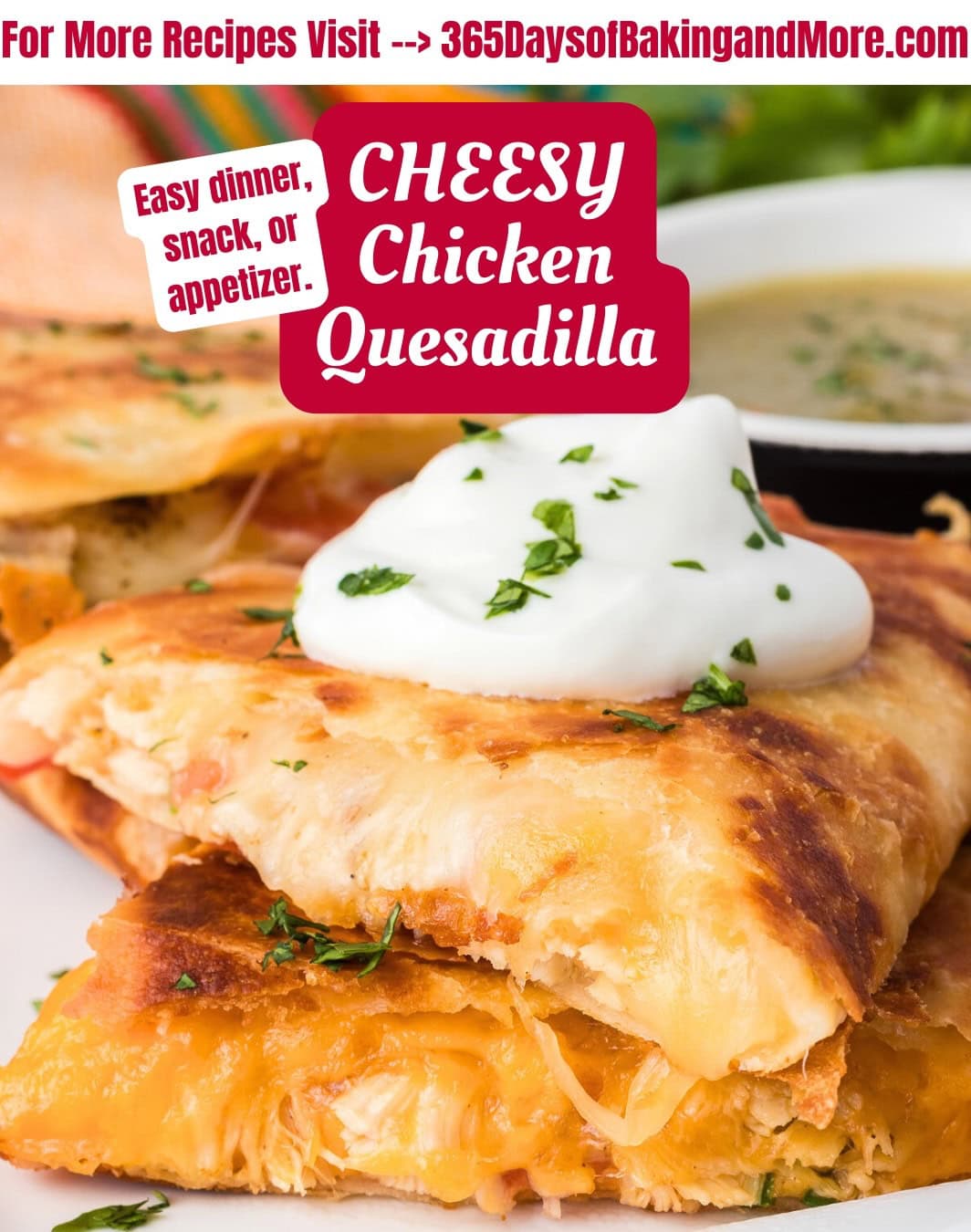 A close-up image of a cheesy chicken quesadilla topped with a dollop of sour cream and sprinkled with chopped herbs, perfect for busy families. Find more easy dinner ideas at "365day