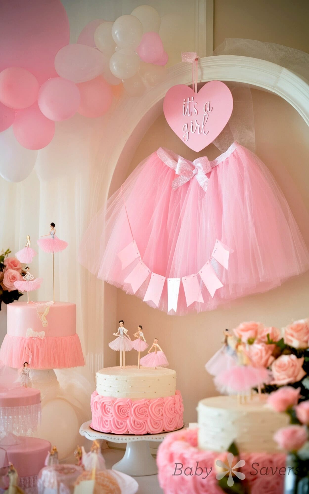 A pink-themed baby shower setup brims with delightful ballet baby shower ideas. Featuring an "it's a girl" sign, the scene includes a pink ballerina tulle skirt, layered cakes with ballet dancer toppers, and an array of pink balloons and flowers adorning the balletcore backdrop.