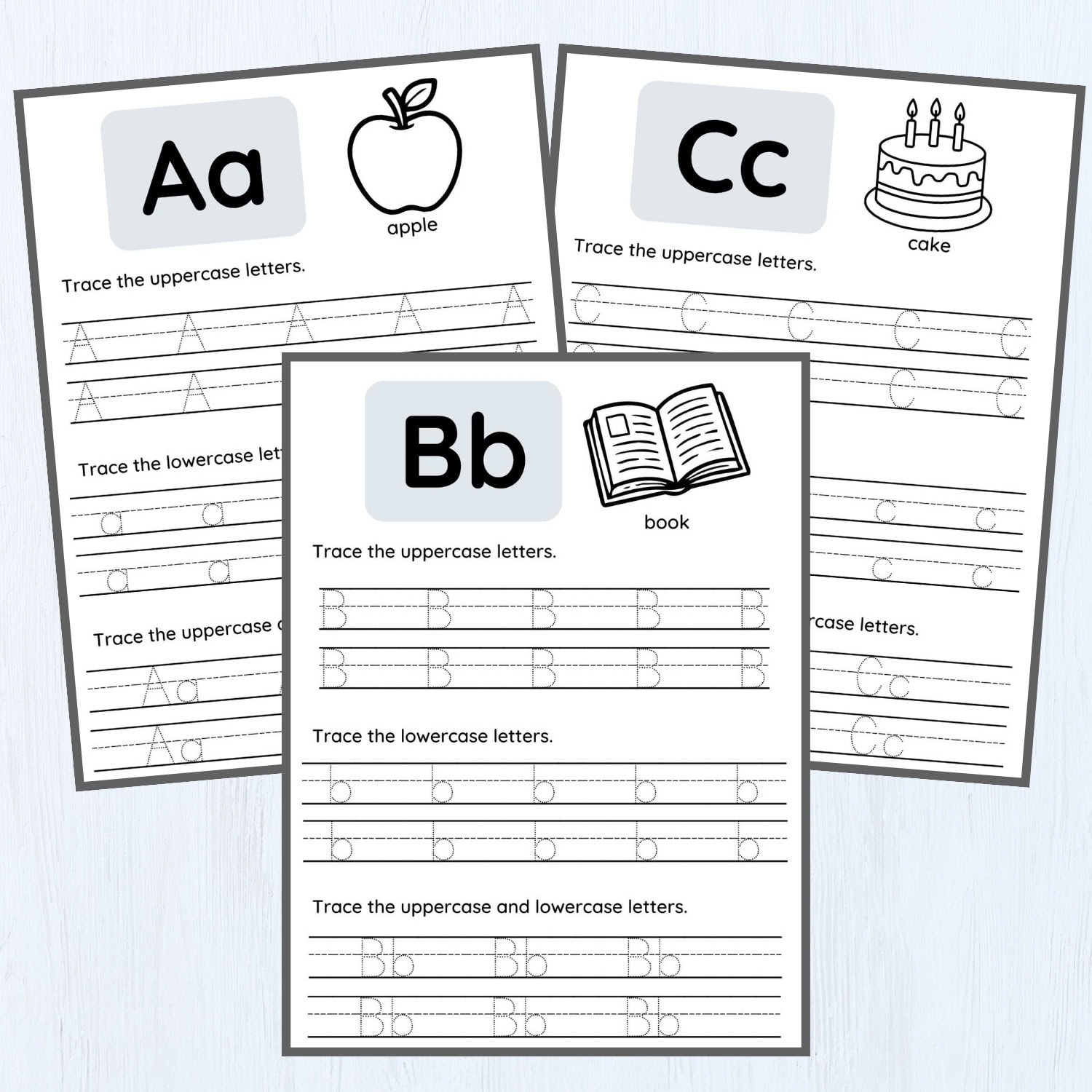 Three letter tracing worksheets teaching letters A, B, and C with images of an apple, book, and cake. Each sheet features uppercase and lowercase letter tracing practice lines alongside matching illustrations.